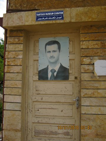 Assad on guardian's door of Tartous museum 2011